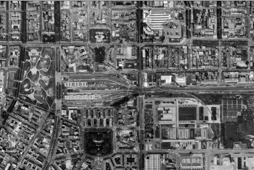 Aerial photograph of the Patch and its neighbouring lots in Milan, 1975, with a dashed outline around the Patch
