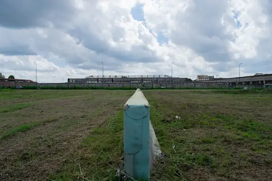 Field with a pointed concrete marker