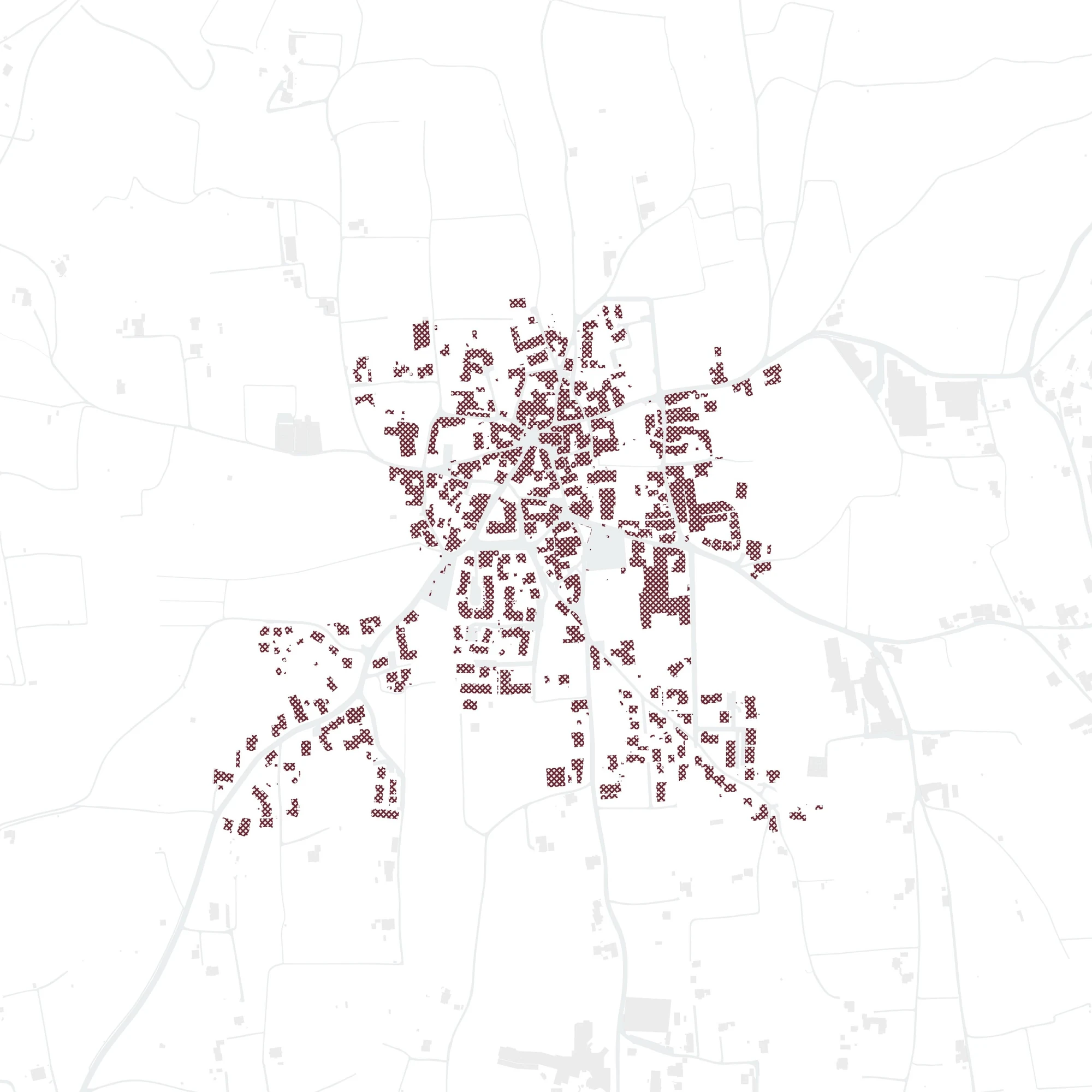 Map of Girlan showing only the built-space layer: the building stock in wine red