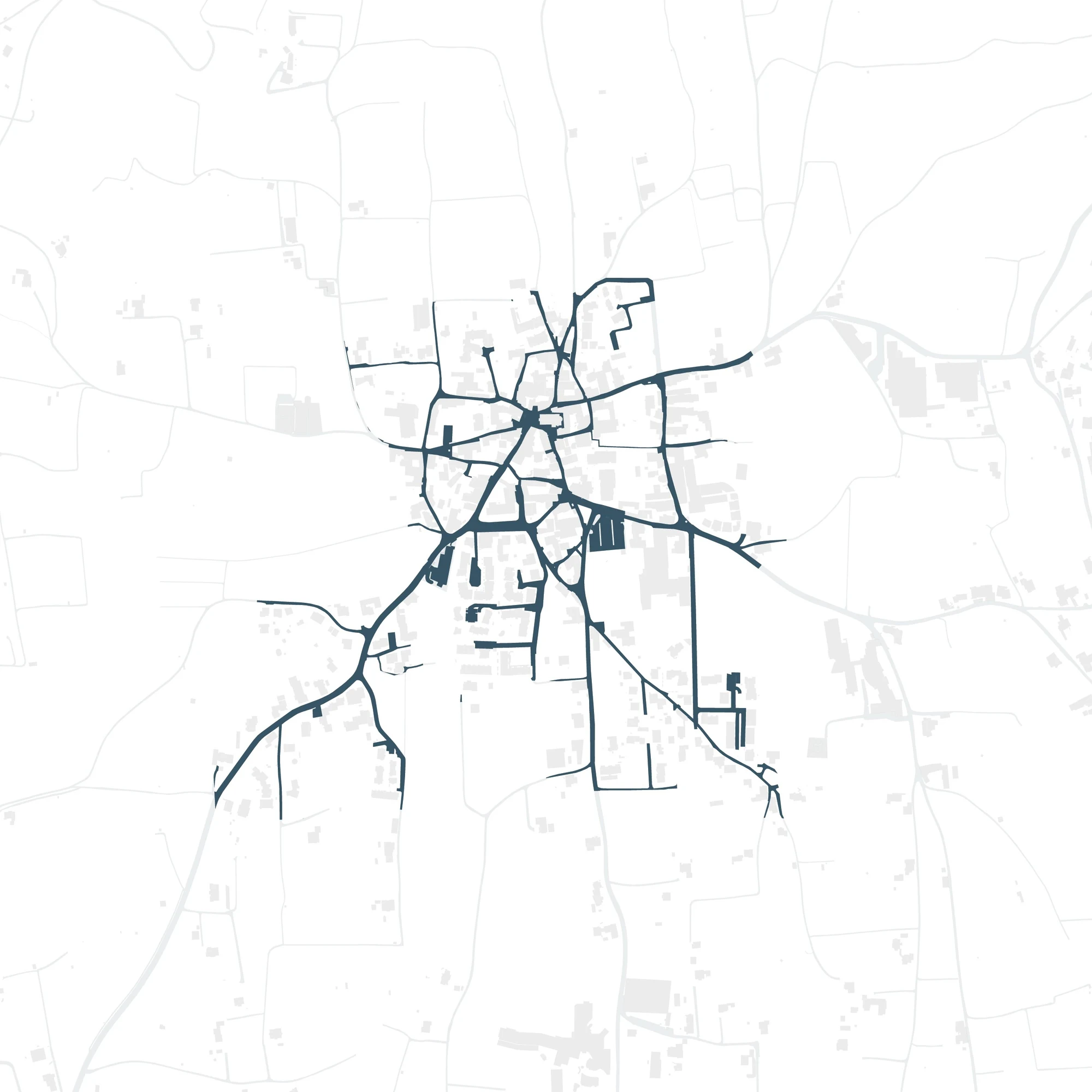 Map of Girlan showing only the public-space layer: a network of streets, squares, and parking in dark blue