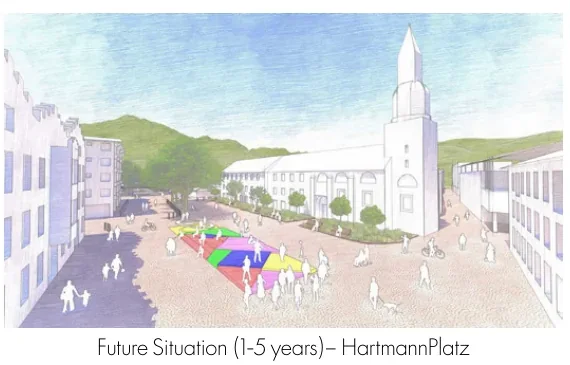 Near-term Hartmannplatz view with a colourful temporary activity area in the centre